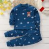 Kinderpyjama, blauw shirt met beertje en voetafdrukken